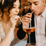 Couple sharing glass of bubbly after their micro-wedding at Happily Hitched Halifax